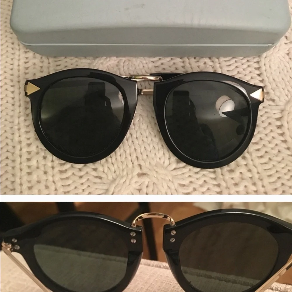 Karen Walker Black Frame Sunglasses with Gold Temples and Dark Green Lenses